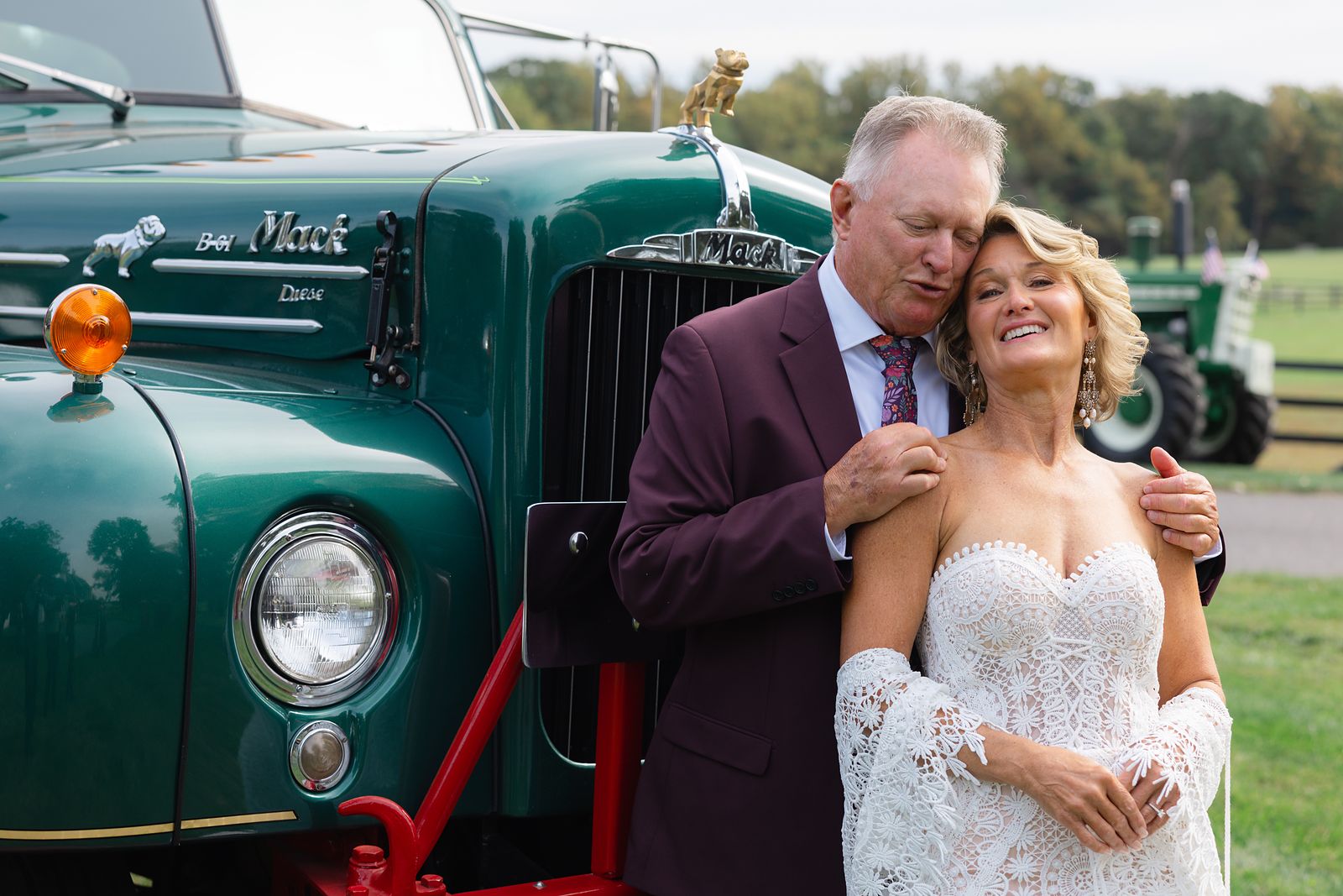 Shannon and Brian with one of Brian's antique green tractors