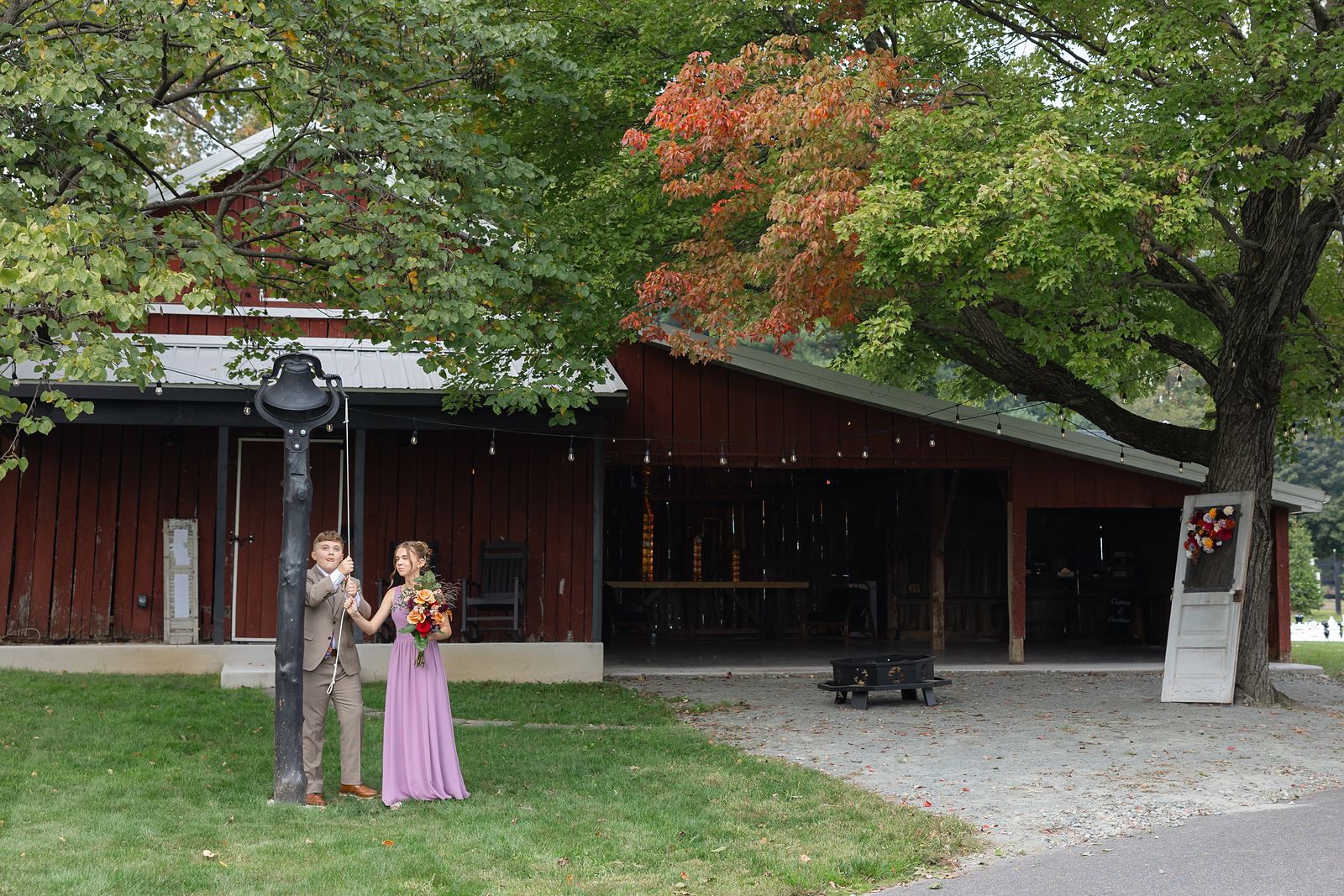 Brian walking toward the ceremony past the barn at Warburton Stables