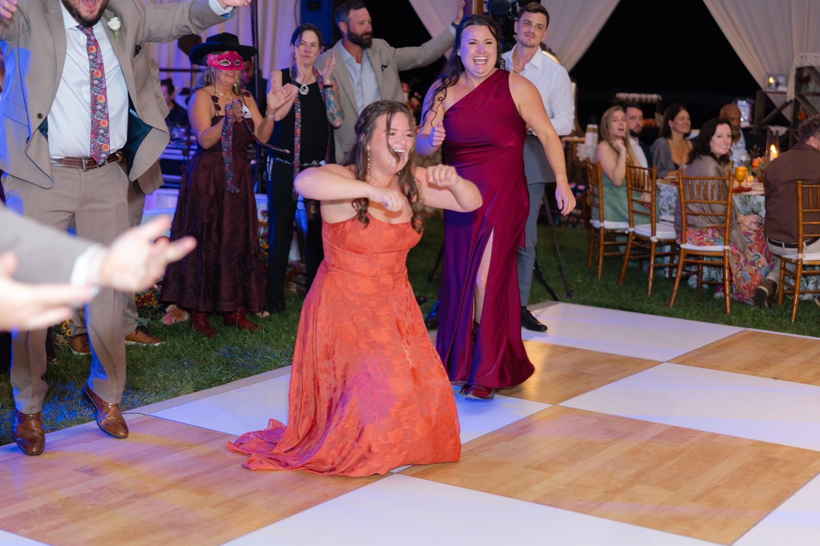 Shannon's daughter and family dancing on the checkered dance floor